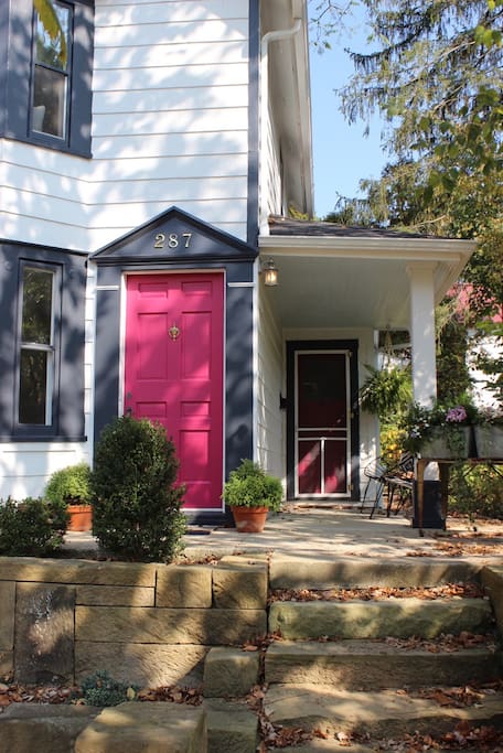 The cheery pink doors invite you to your stay!