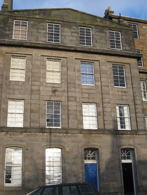 The flat is on the (UK) first floor - meaning the second floor in the US. It's the best floor for combining easy access and privacy from the street. The exterior has characteristic 1820's-30's 'lying panes' (horizontal aspect glazing).