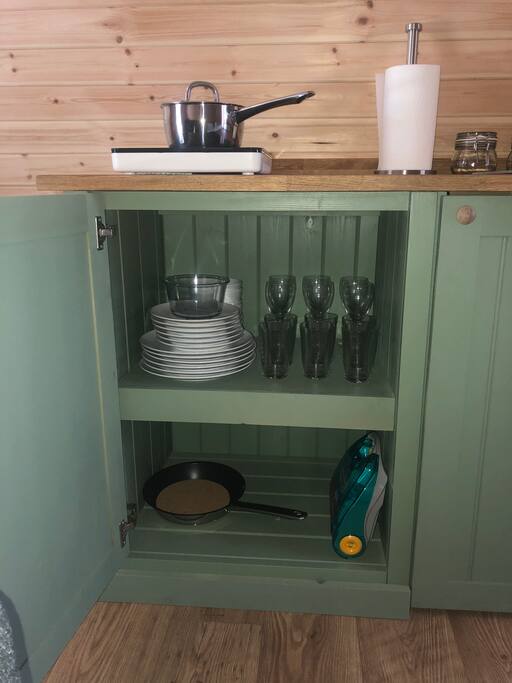 Plates, glasses, pots and pans and cutlery