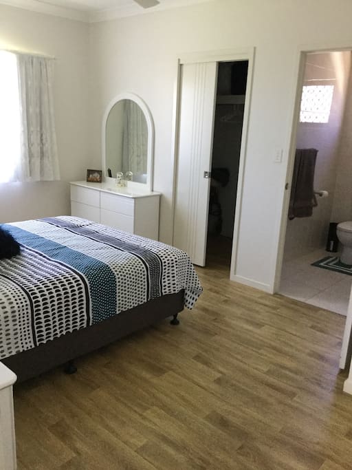 Large walk in wardrobe. Large bathroom, fitted with safety hand rails.