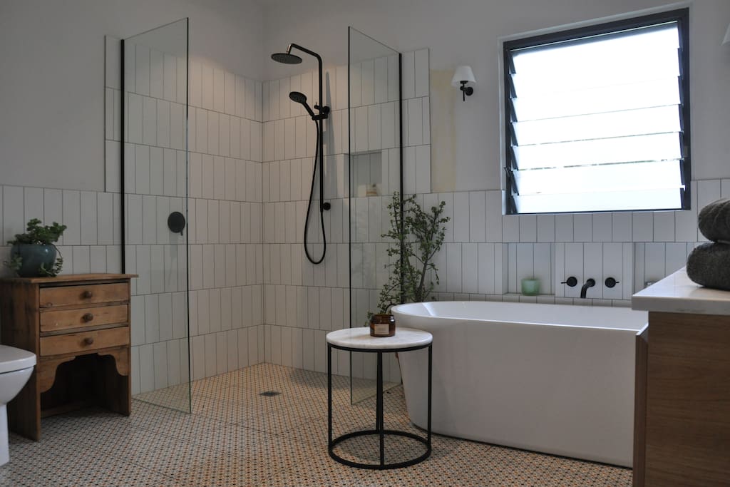 extremely spacious bathroom, massive shower, vanity and huge relaxing bath