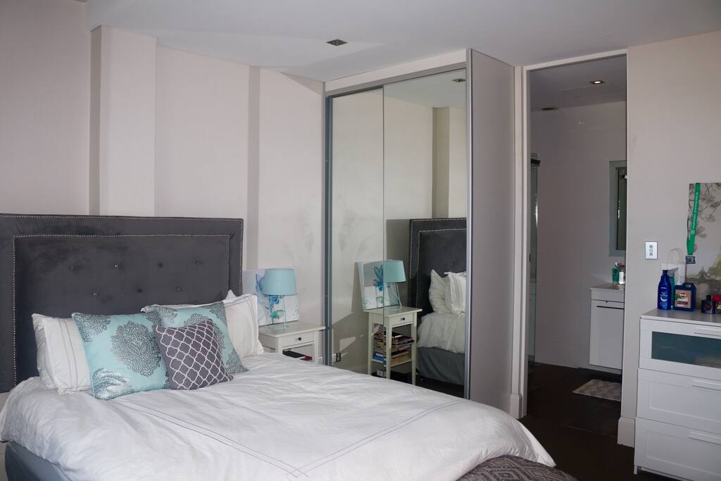 Luxury queen bed with private ensuite.