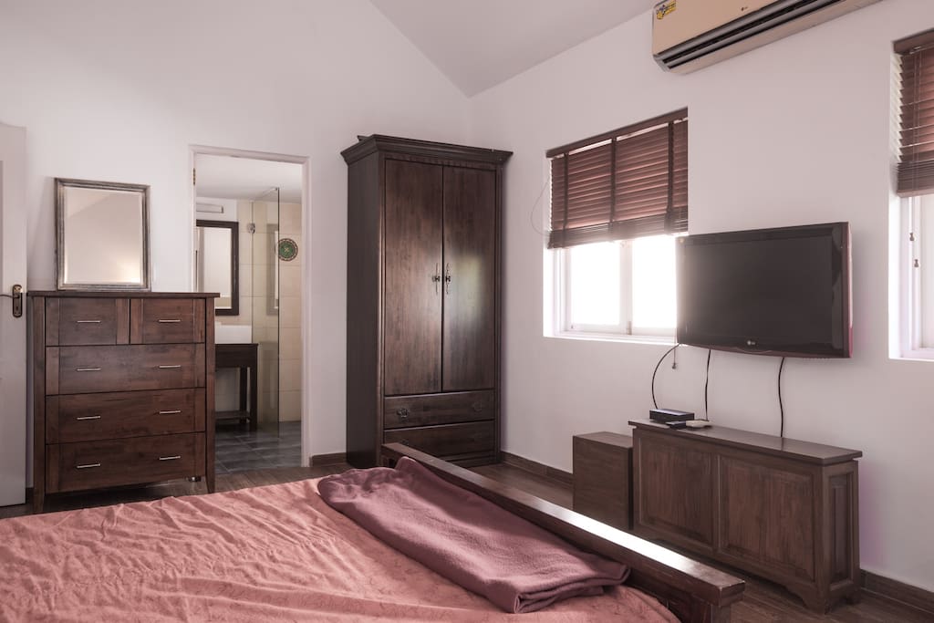A view of the bedroom with ensuite