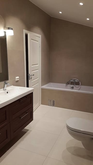 Bathroom with shower and tub
