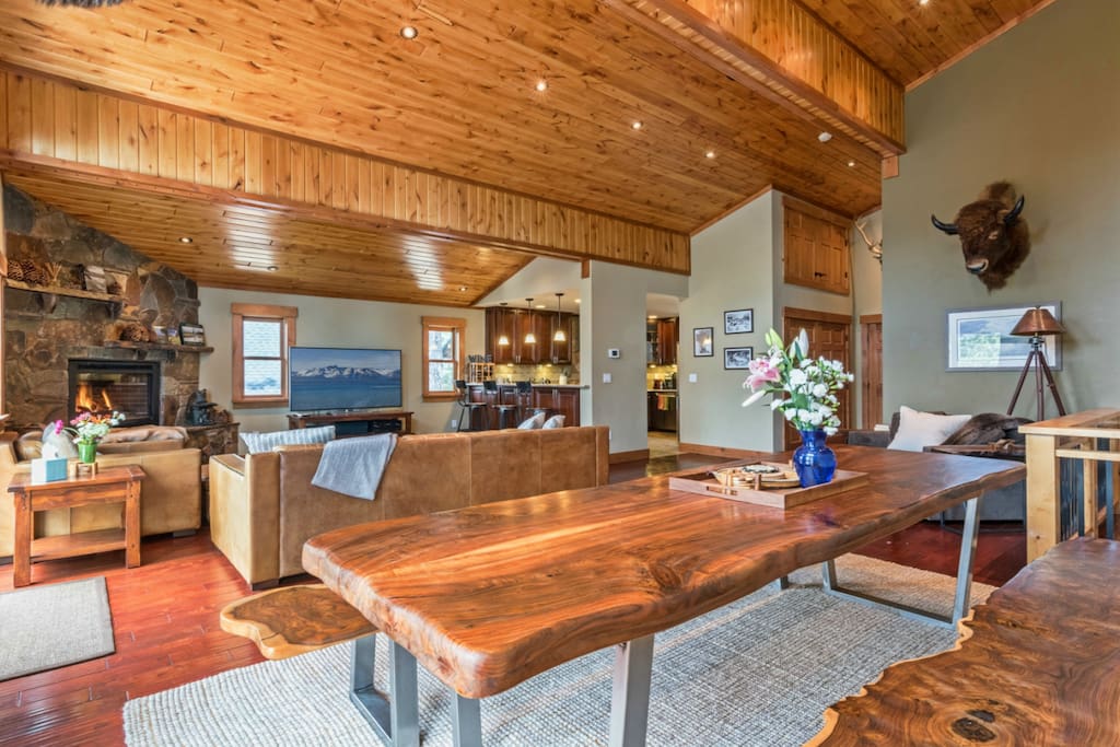 Great room with custom dining table, 70" HDTV, gas fireplace + surround sound!
