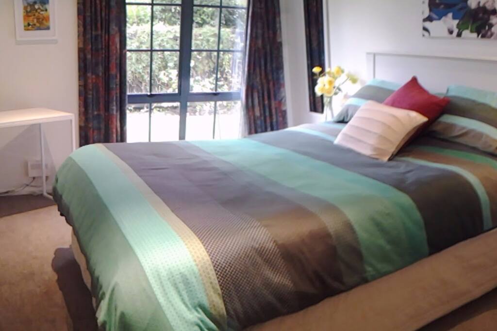 Spacious bedroom 1 with queen size bed