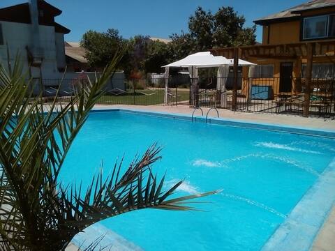 House with a swimming pool, gardens, gazebo, and more