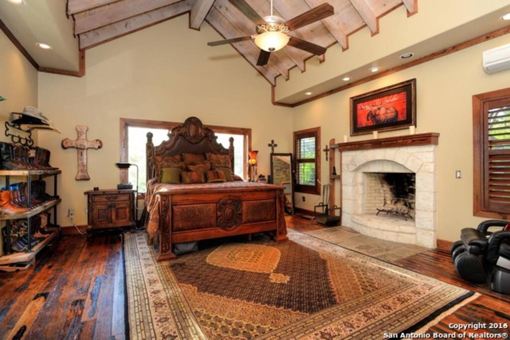 Master suite with fireplace and Private Bathroom.