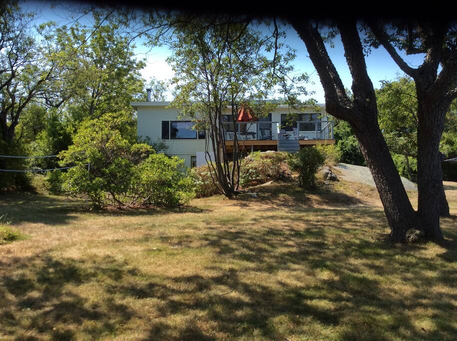 The House, with a deck to enjoy every sunset