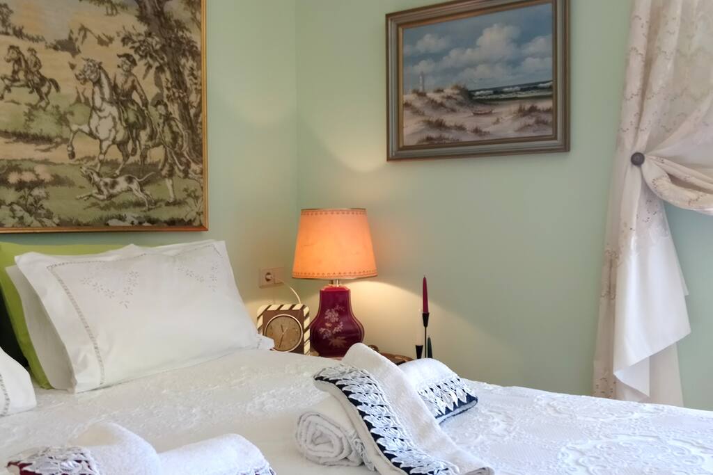 Bedroom with a double bed and access to the garden