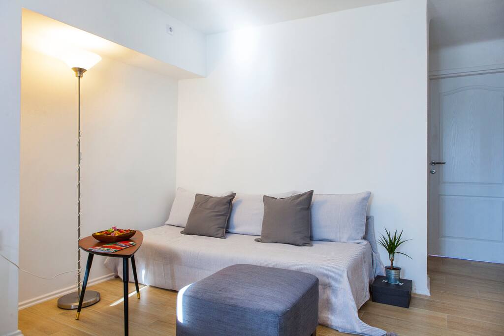 Living room, sitting area, sofa turns to bed