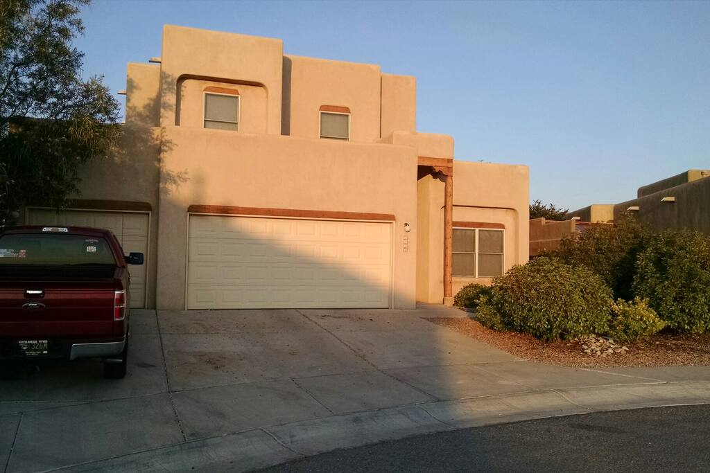 Our New Mexican home ready to welcome you. Please do not park on the right side of the driveway as we utilize that side of the garage.