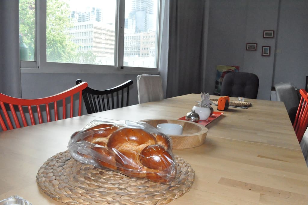 Table seats 10-12 comfortably with room for more children. Complimentary challah (bread), cream cheese and fruit basket.