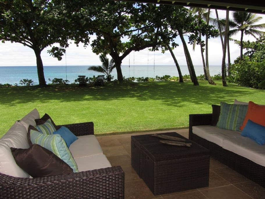 Outdoor lanai and beach front yard