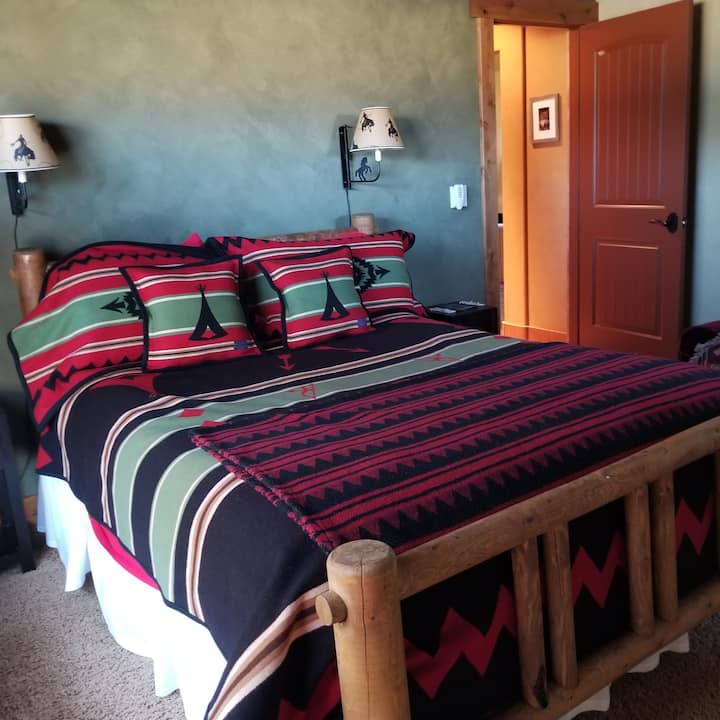 Queen bed, ensuite bathroom, with shower. Has a large ceiling fan with remote controlled operation.