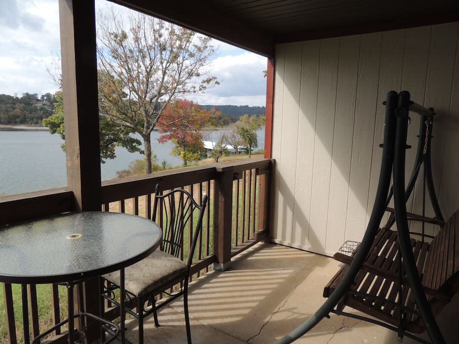 Walk off to the lake with a deck swing