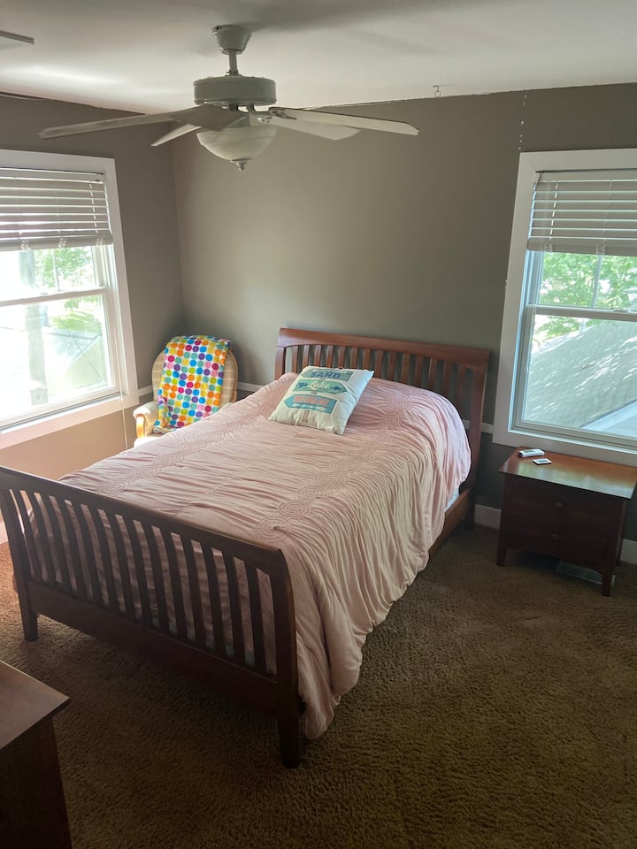 3rd bathroom, with full bed and glider.