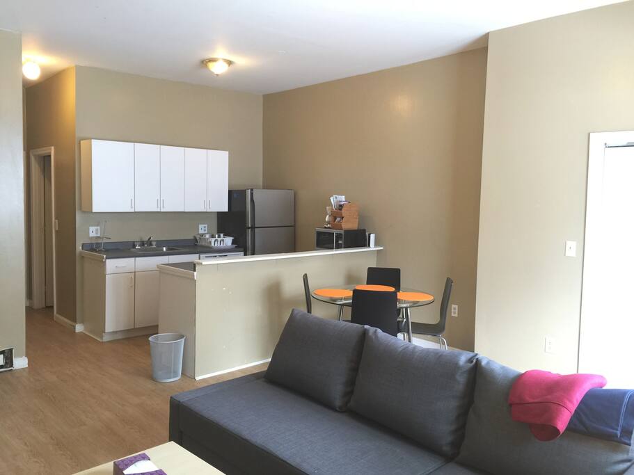 Upper living room and kitchen - remember this is a combo of 2 units that are accessed via an interior stairwell (no need to go into the common building areas)