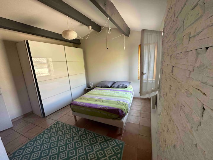 Our double room welcomes you with a comfortable bed, a spacious wardrobe to store your belongings, reversible air conditioning, and a sanitary. A perfect relaxing space.