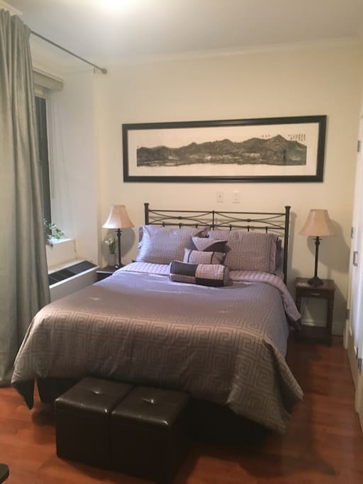 Designer Bedroom with Deluxe Queen Bed.