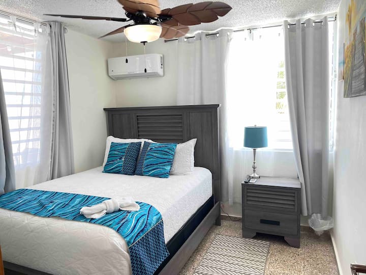 2nd Bedroom: Tropical vibes with ocean-inspired decor and bright natural light!