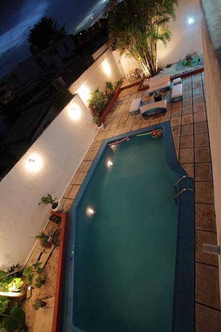 SWIMMING POOL BY NIGHT & PATIO