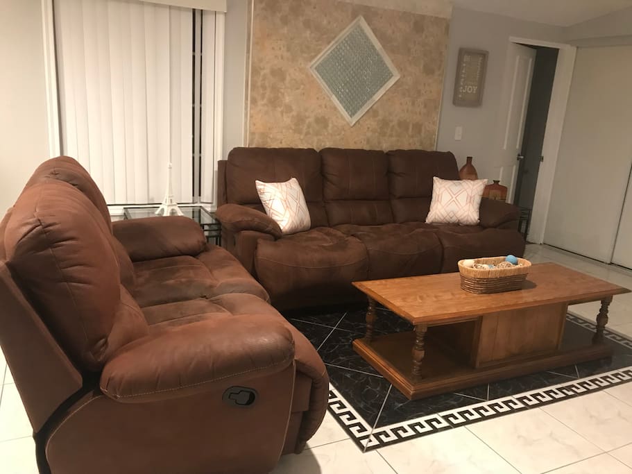 Sofa in living room with recliner