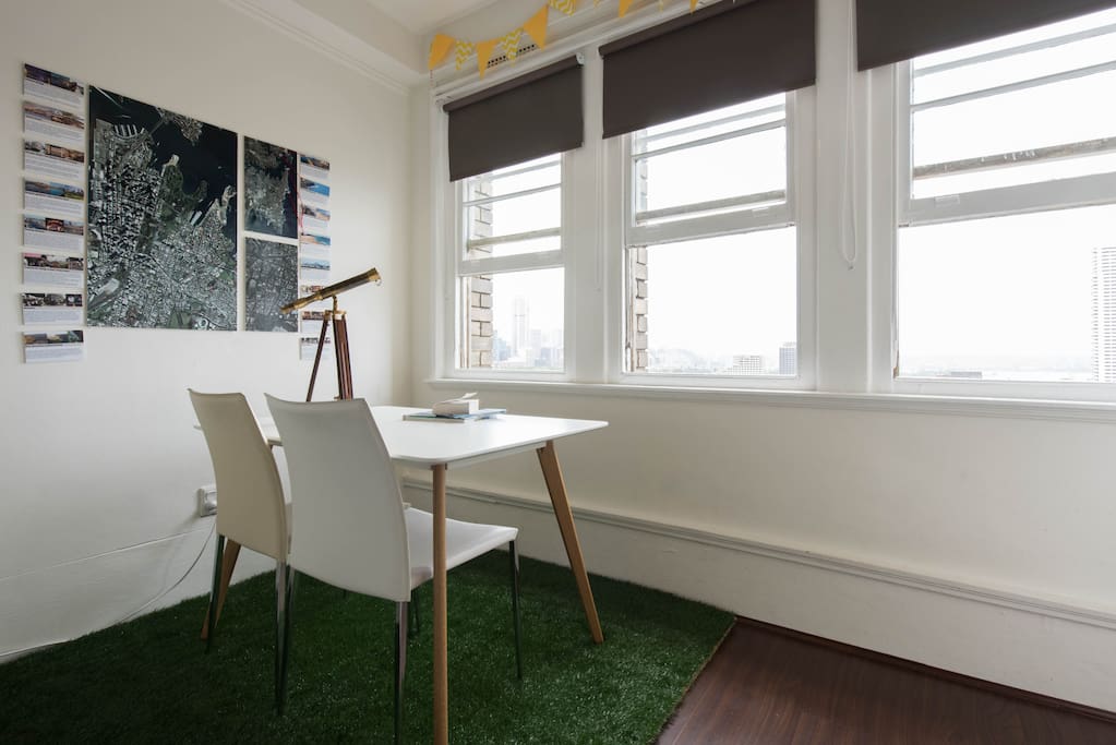 The table and telescope look out over pretty much all of downtown Sydney (only a 10 minute walk away). ..and yes that's awesome fake grass on the floor (it feels good between your toes)!