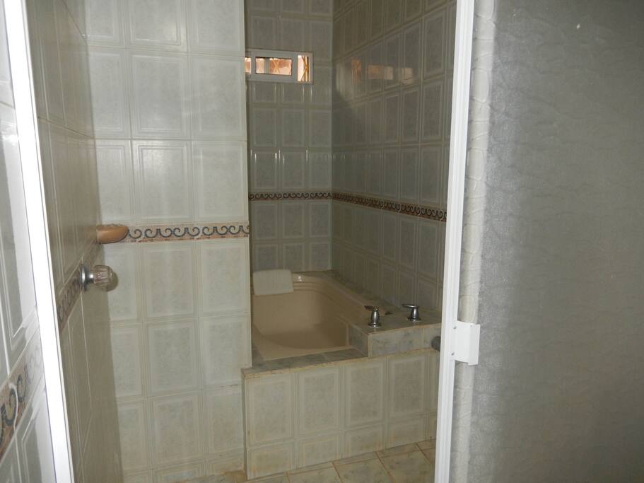 One of the bedrooms has a bath, we are working on hot water though