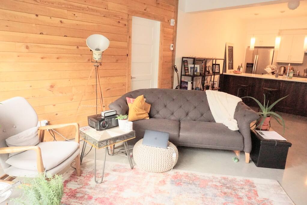 Living room with kitchen and dining area in the back