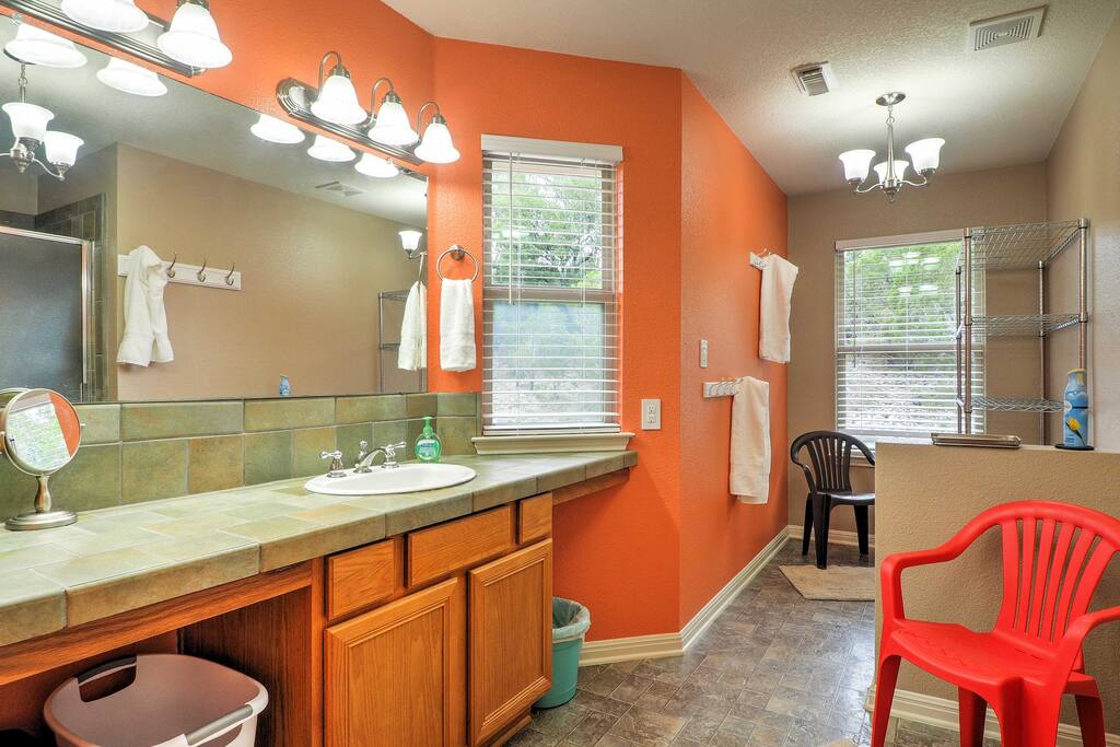 Getting ready is effortless in this private en-suite bathroom.