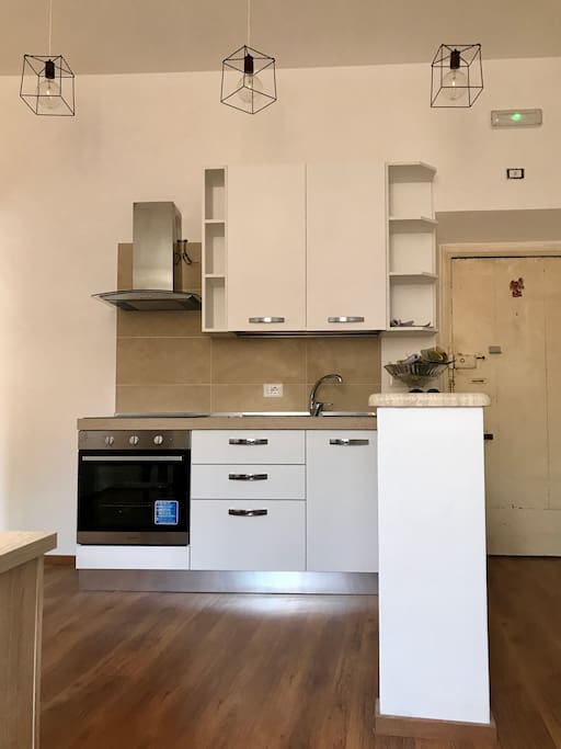 Salotto con cucina a vista