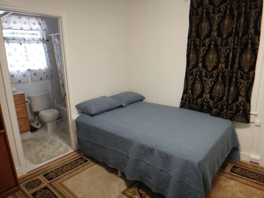 Bedroom with private full bathroom