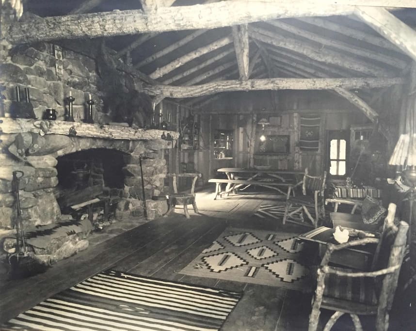 Another great photo of the great room from 1930's. Notice the wide plank clear heart redwood floors, stick furniture and wood accents are still beautifully in place today.