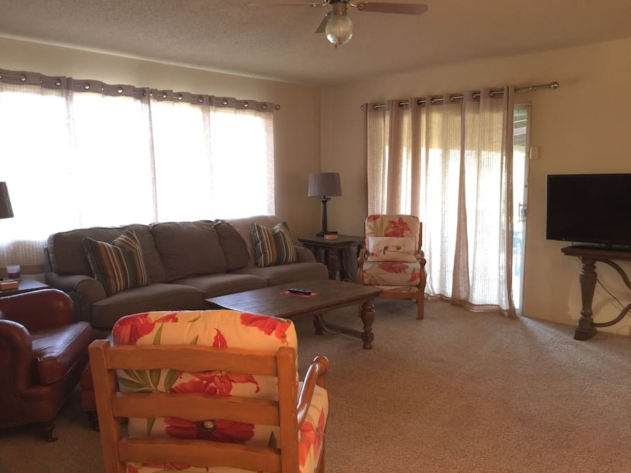 Great Living room to gather in with lots of light and beautiful view