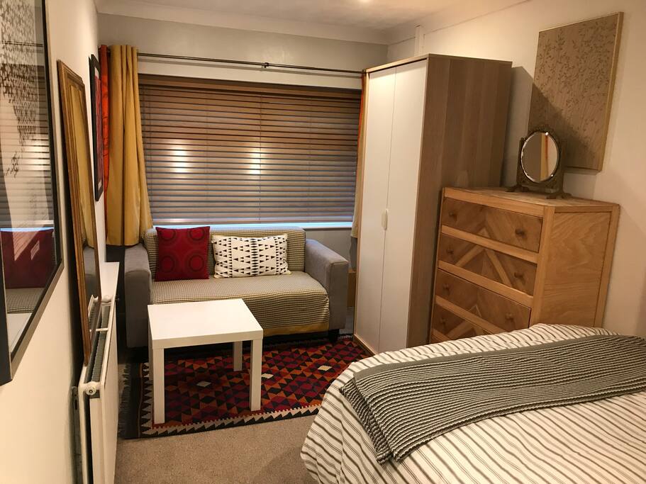 Lounge/work area of guest room.