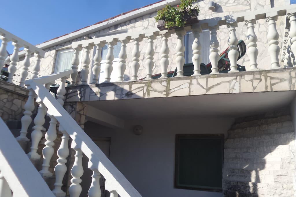 Stairs leading to the apartment on the first floor