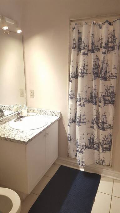 clean washroom with standing shower
