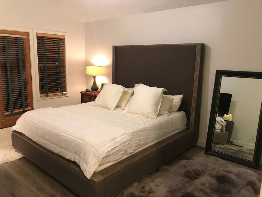 Master Bed (tv across from Bed) (balcony is where the door leads too.... in the summer we have two loungers)