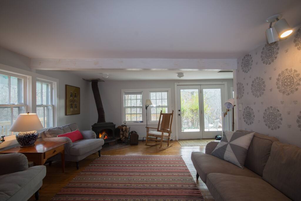 Large living room with wood burning stove