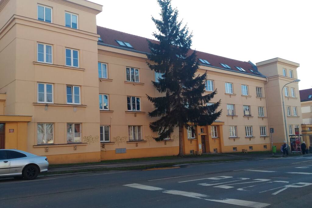 Behind the house is bus station