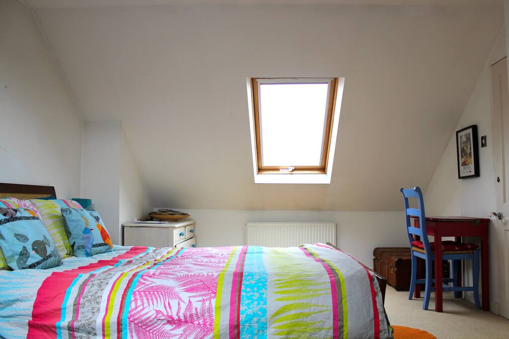 Your bright and sunny attic room with super comfy kingsize bed