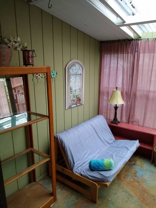 Futon couch can sleep 1 to 2 additional people. Another futon is added for more comfort.