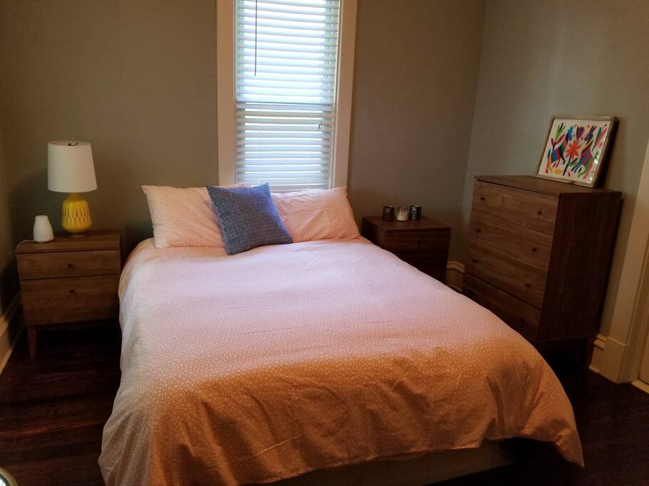 Queen bed with comfy pillows. Perfect to end the day.
