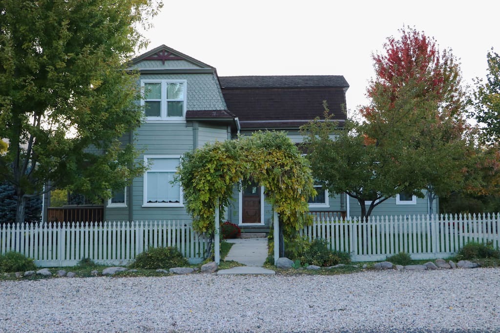 Main house as seen from the street. Park in driveway to right (north) side of house.