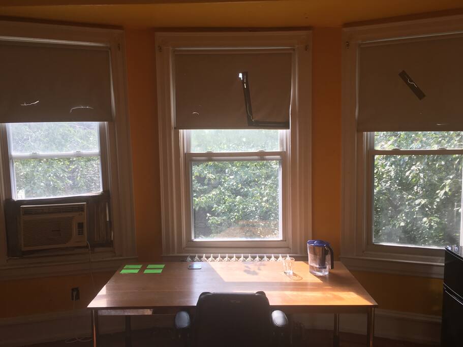Three windows lots of light and desk