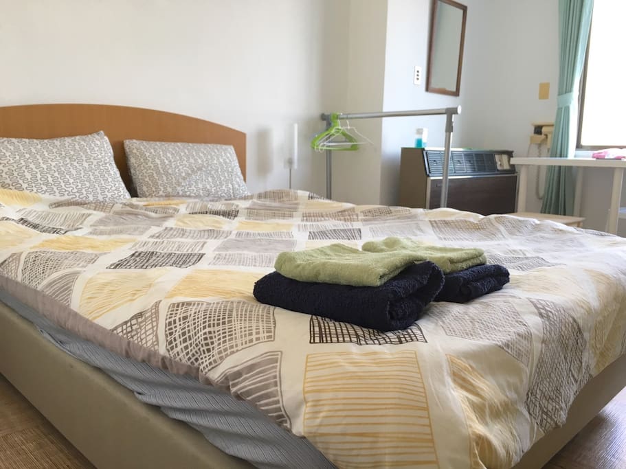 this room has one double bed and one single bed
