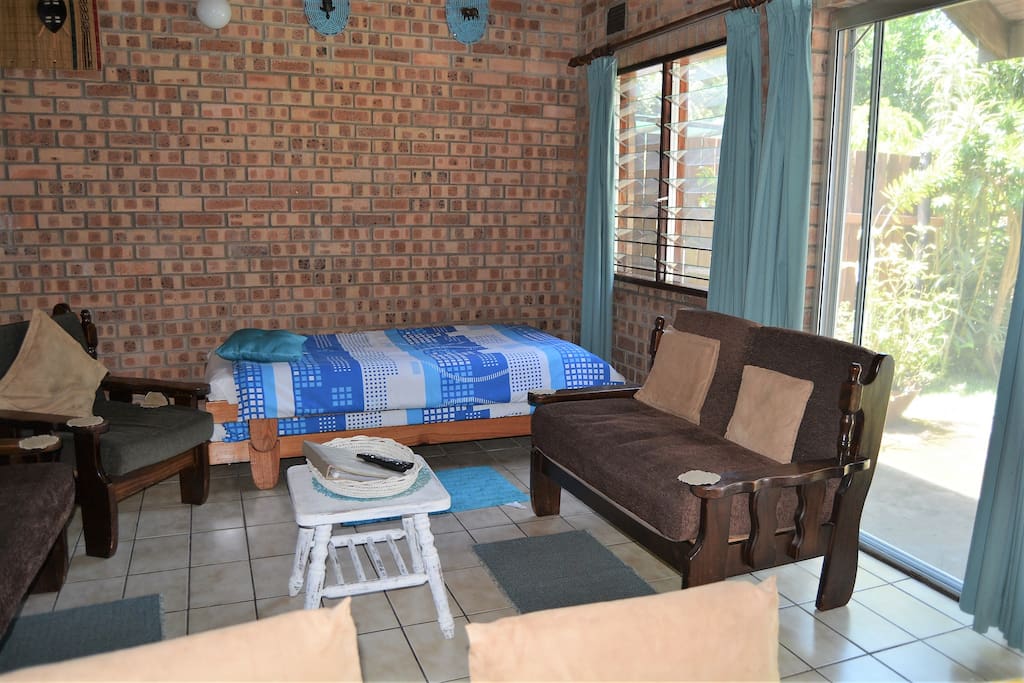 Garden Cottage lounge and single stack beds for children