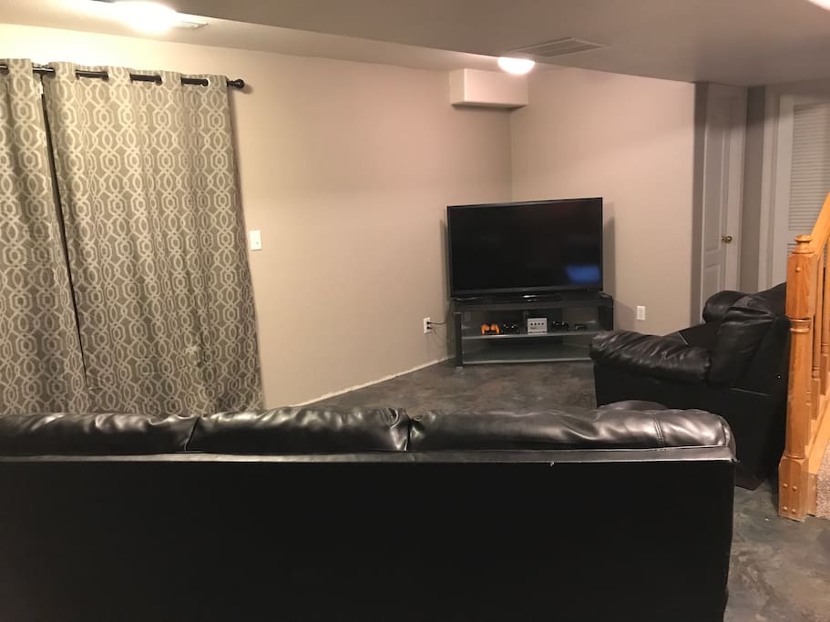 Private living space with couches and TV