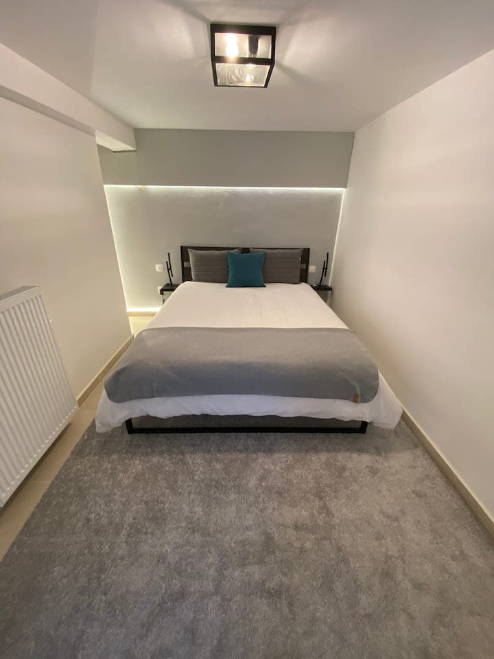 Bedroom boasting a large double bed